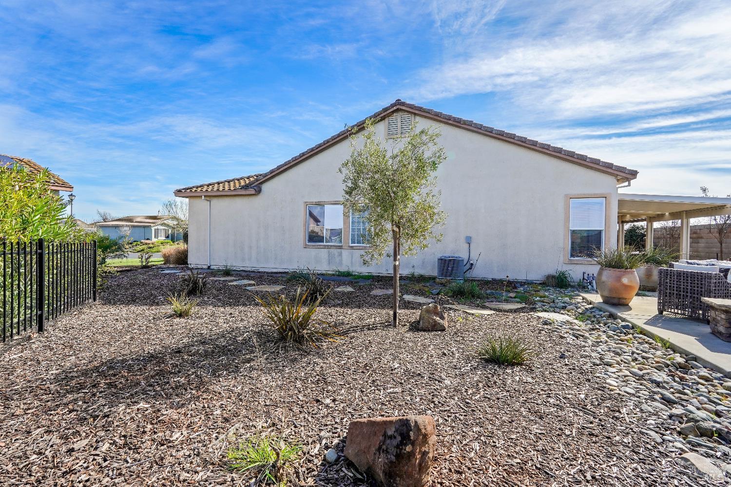 341 Watson Hollow Drive Rio Vista, CA 94571 - Photo 29 of 38 a backyard of a house with yard and outdoor seating