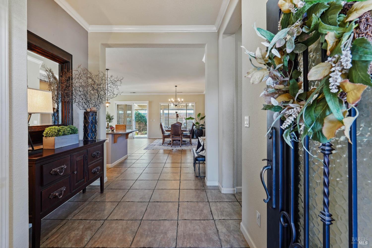 341 Watson Hollow Drive Rio Vista, CA 94571 - Photo 4 of 38 a lobby with a potted plant and a large mirror