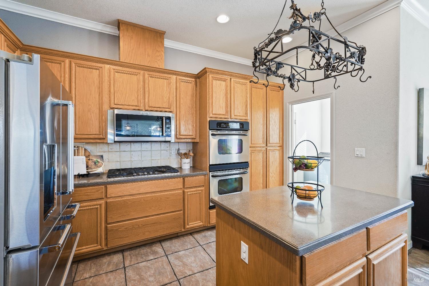 341 Watson Hollow Drive Rio Vista, CA 94571 - Photo 8 of 38 a kitchen with stainless steel appliances a sink a stove cabinets counter space and stainless steel appliances