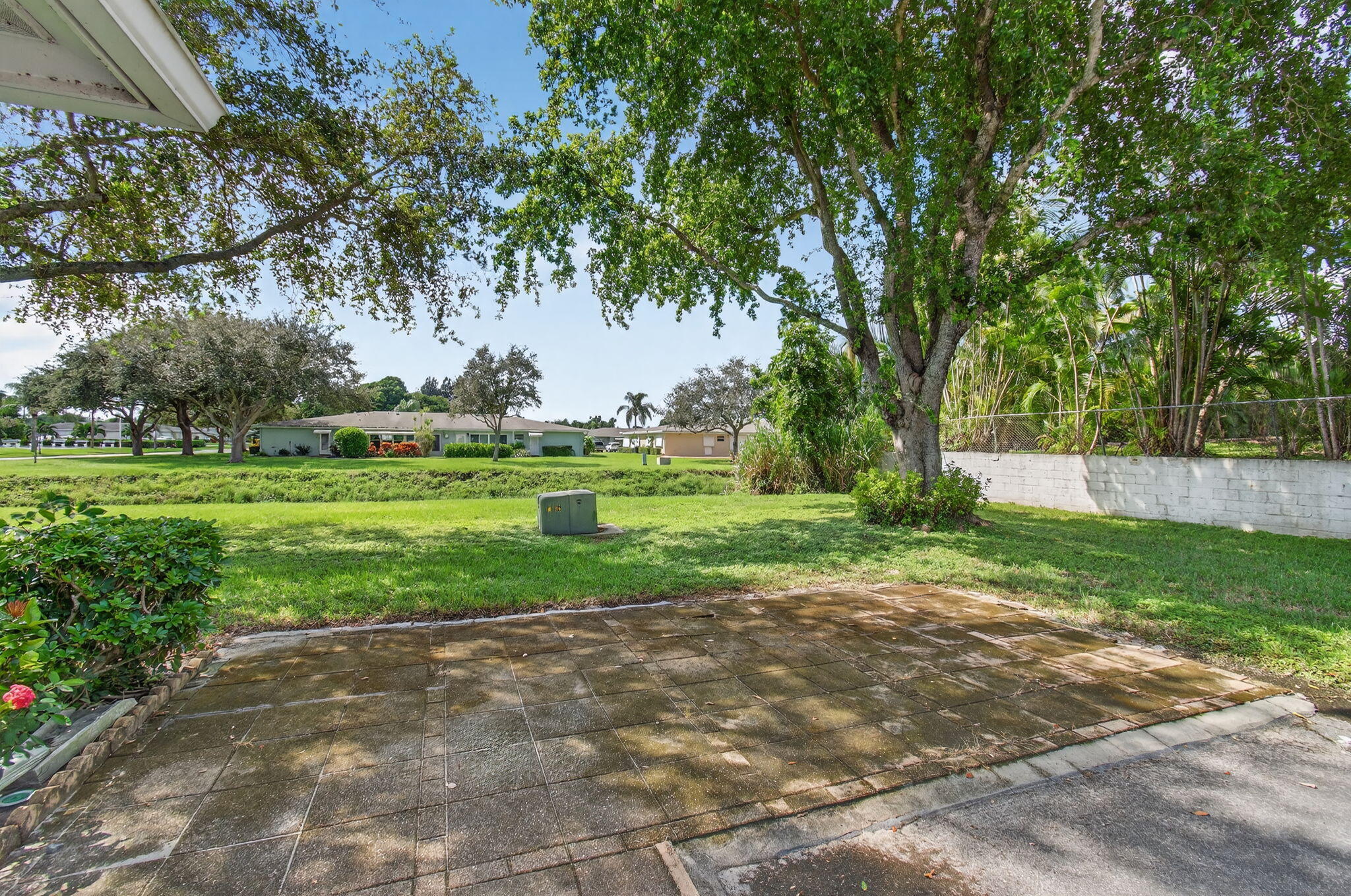300 High Point Boulevard Delray Beach, FL 33445 - Photo 34 of 37 Extended patio w/view of canal