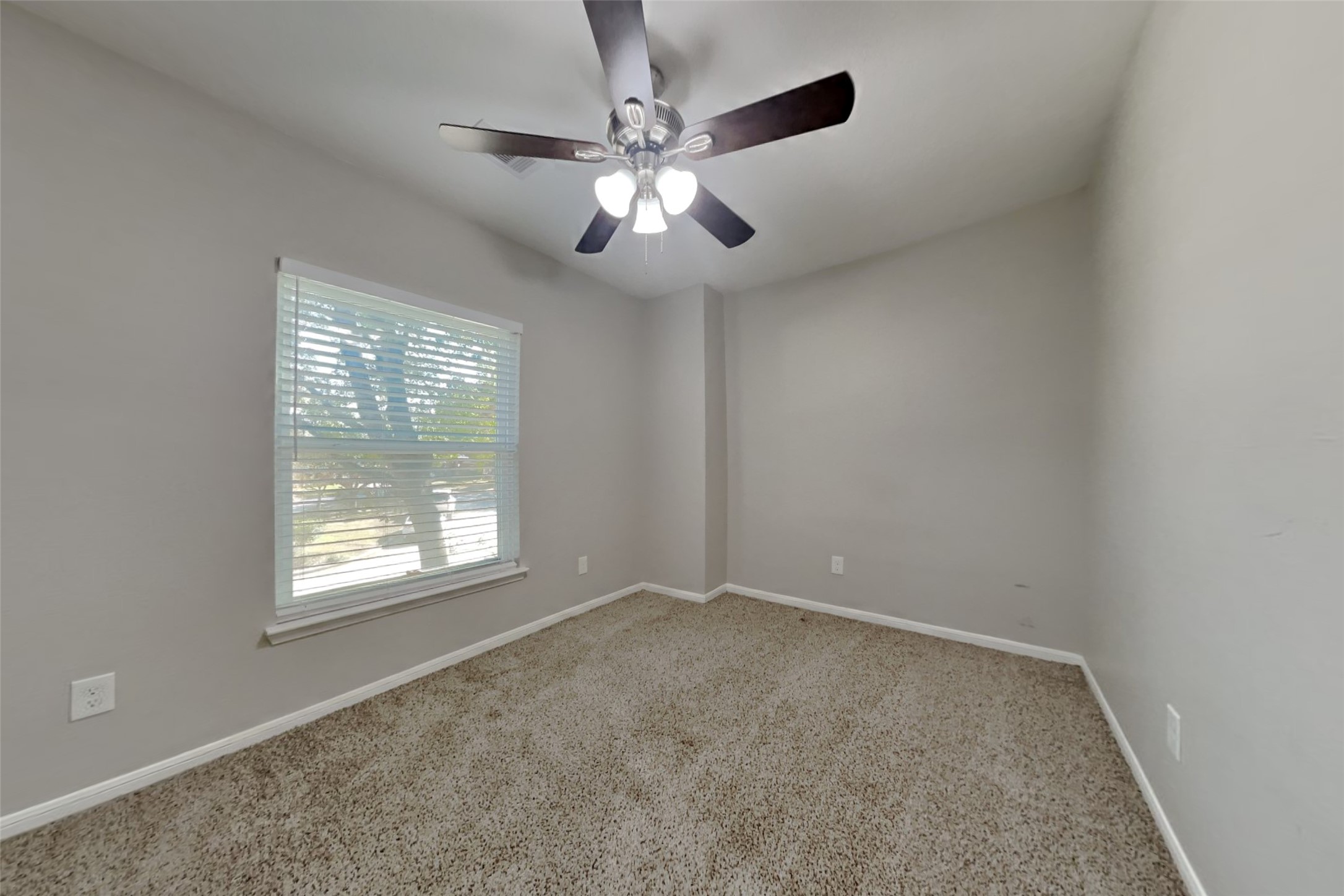 514 Rams Bottom Court Spring, TX 77388 - Photo 15 of 19 an empty room with windows and fan