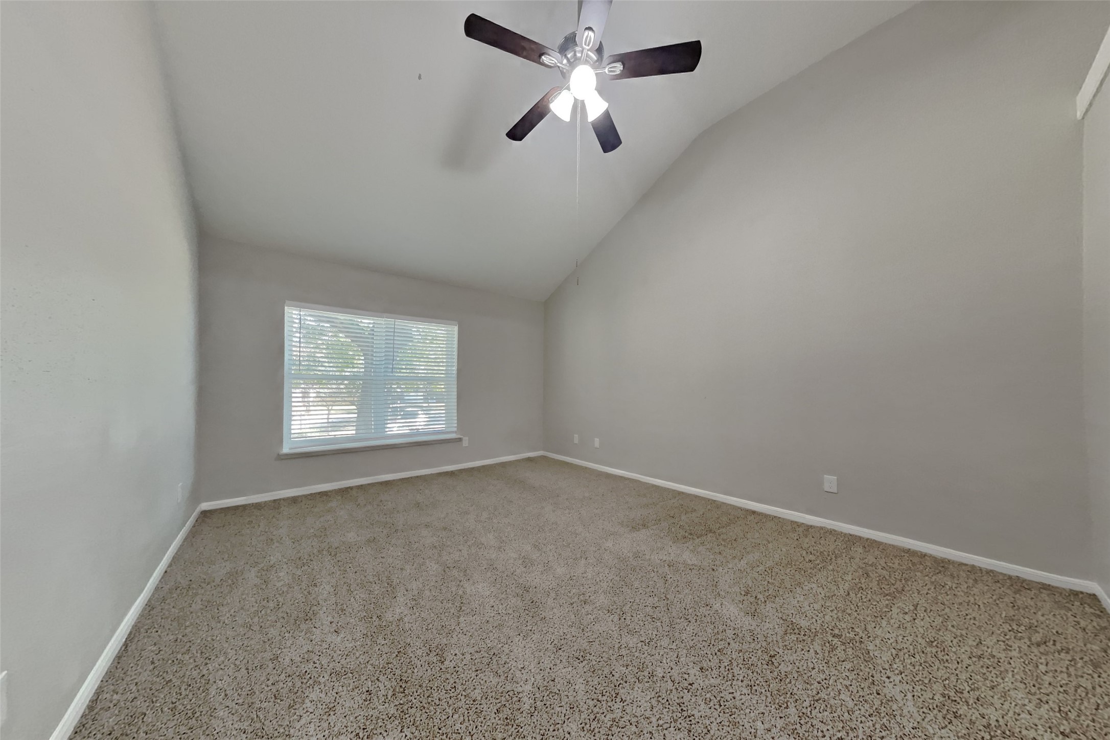 514 Rams Bottom Court Spring, TX 77388 - Photo 10 of 19 en empty room with windows and fan