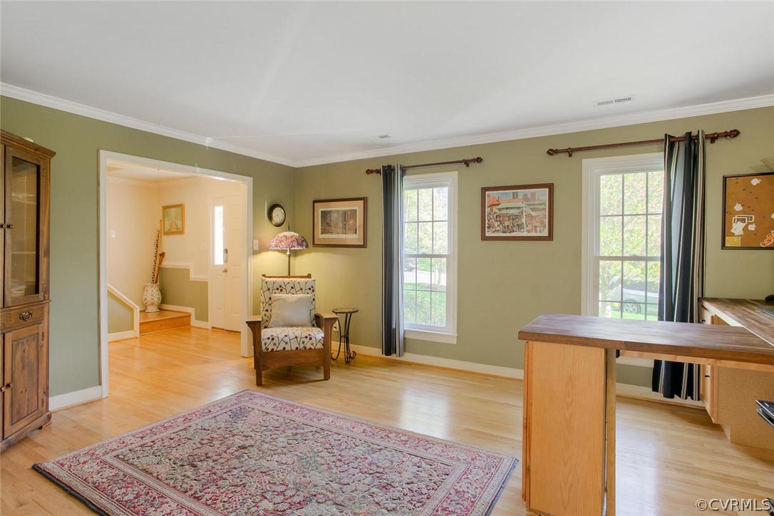 15201 Powell Grove Road Midlothian, VA 23112 - Photo 4 of 27 a living room with furniture and a table