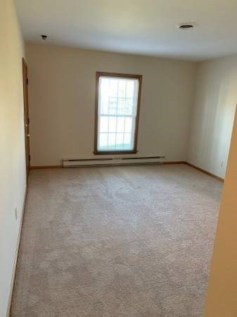 29 Leo's Lane Avon, MA 02322 - Photo 5 of 8 an empty room with a window