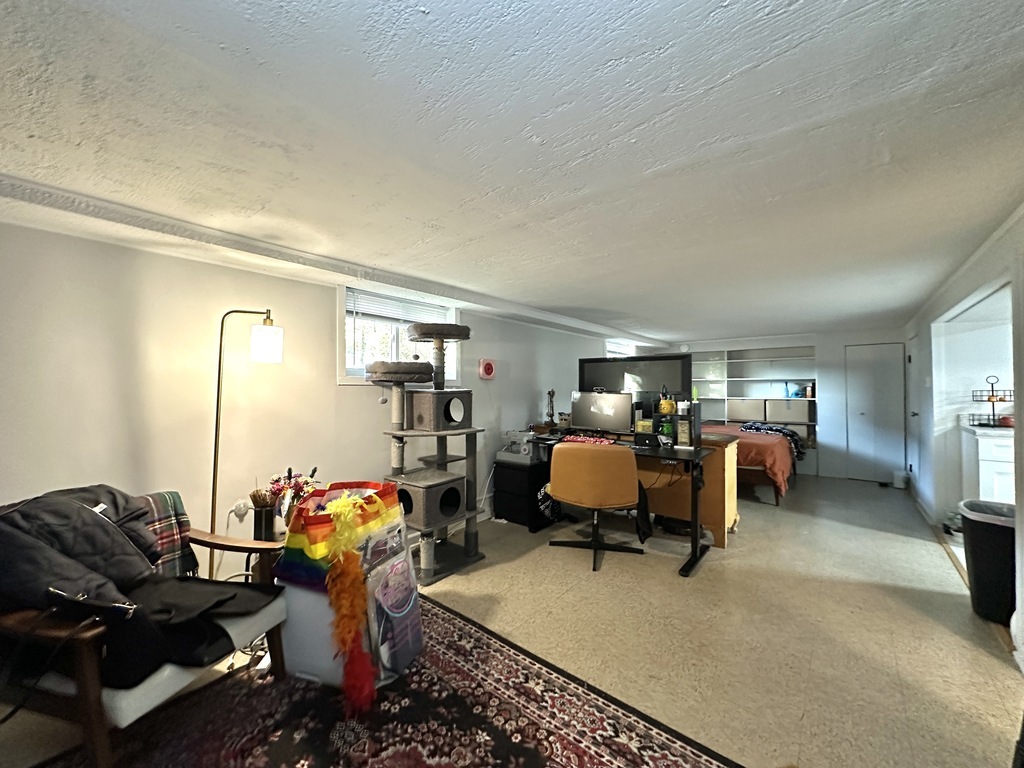 5701 North Keystone Avenue, Unit GDN Chicago, IL 60646 - Photo 12 of 20 a bed room with furniture and a window