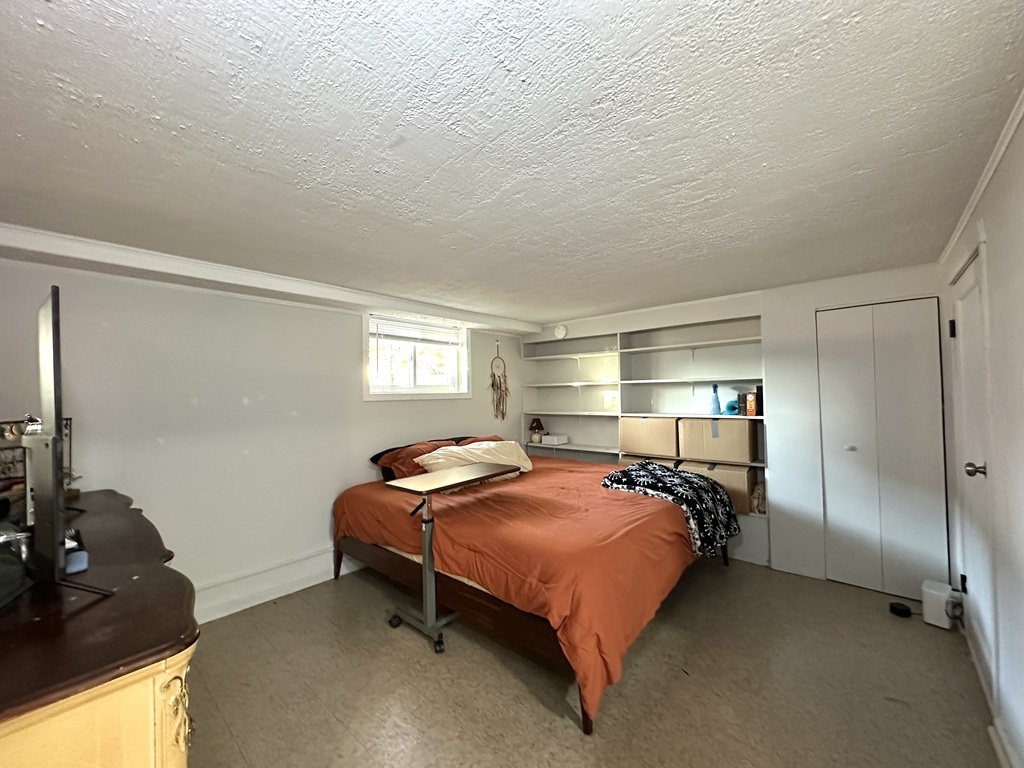 5701 North Keystone Avenue, Unit GDN Chicago, IL 60646 - Photo 14 of 20 a bedroom with a bed and a window