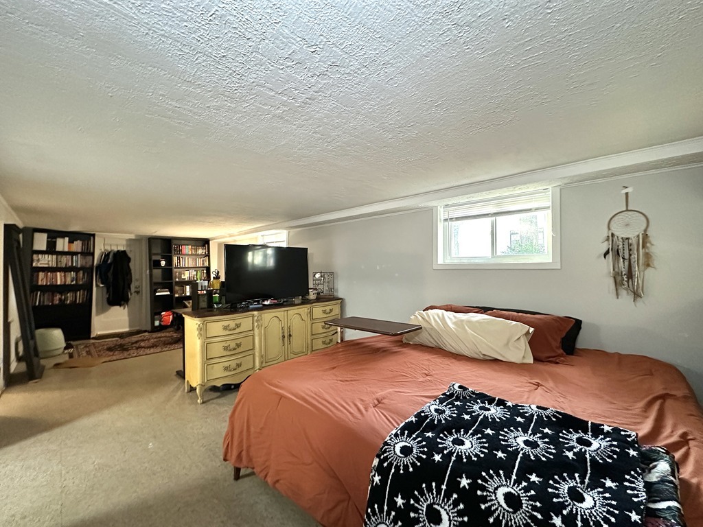 5701 North Keystone Avenue, Unit GDN Chicago, IL 60646 - Photo 15 of 20 a bedroom with bed and tv