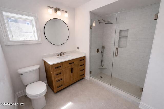 124 Ritch Avenue, Unit B301 Greenwich, CT 06830 - Photo 6 of 7 a bathroom with a sink toilet and shower