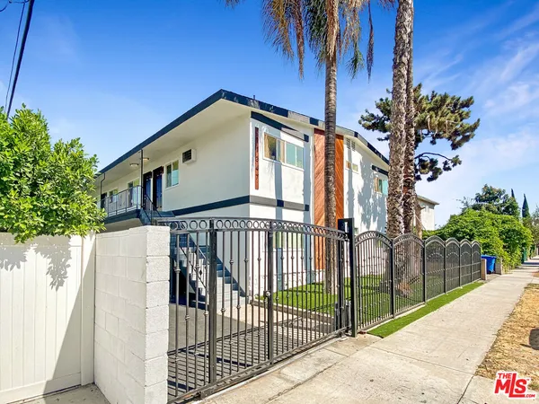 a view of a house with a street
