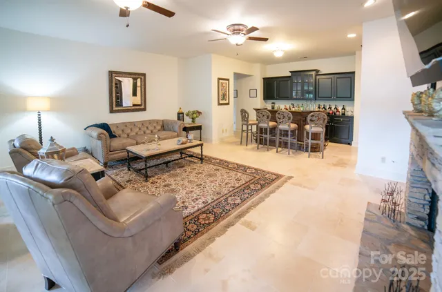 a living room with furniture and a table