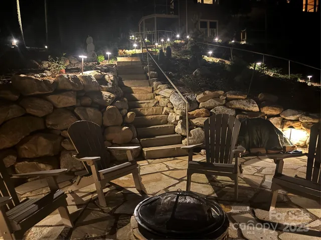 a view of a chairs and tables in patio