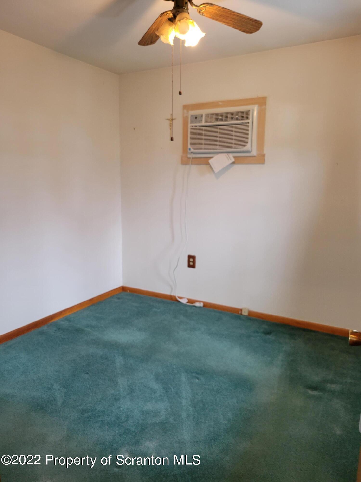 106 Billy Lane Taylor, PA 18517 - Photo 8 of 15 a view of an empty room