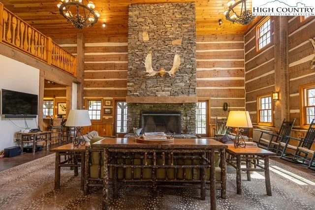 a view of steet with a couch and wooden floor