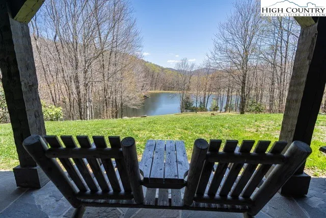 a view of a deck with furniture