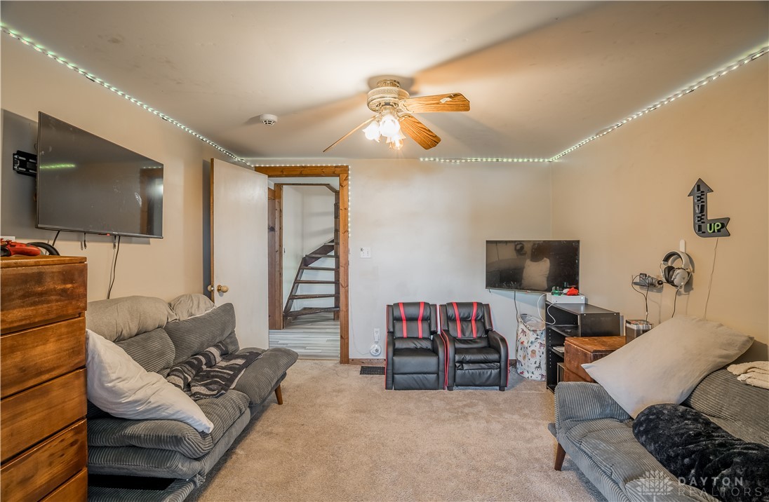 220 Racer Street Troy, OH 45373 - Photo 10 of 33 This inviting bedroom features ample space and dual closets creating a comfortable living area.