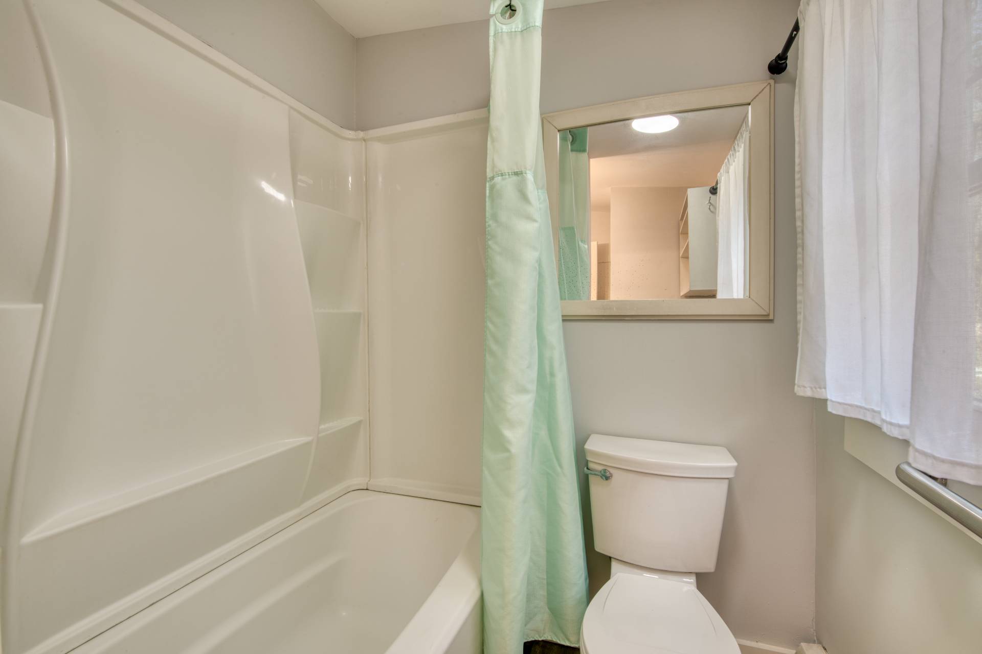 205 Little Fresh Pond Road Southampton, NY 11968 - Photo 13 of 20 a bathroom with a toilet and a bathtub