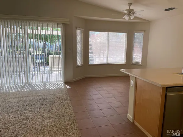 a kitchen with stainless steel appliances a refrigerator a stove top oven a sink and dishwasher