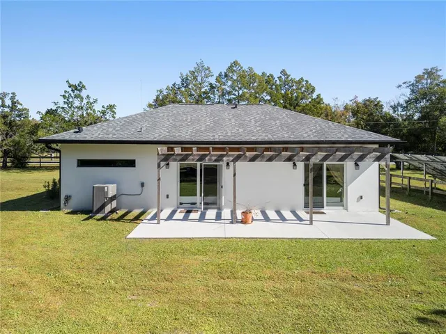 a wooden bench sitting in the middle of a building