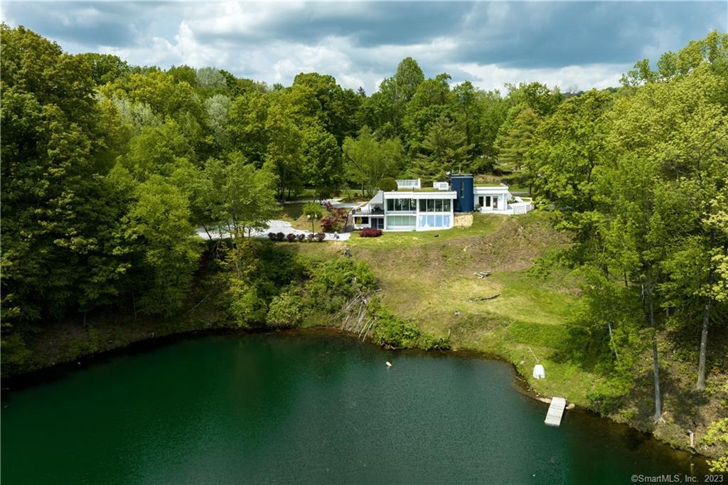 60 Ore Hill Road Salisbury, CT 06039 - Photo 1 of 1 a view of a lake with houses