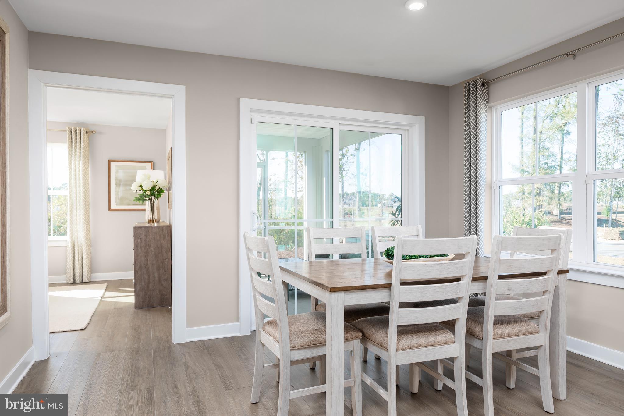604 Augustine Court Aberdeen, MD 21001 - Photo 3 of 9 a dining room with furniture and window