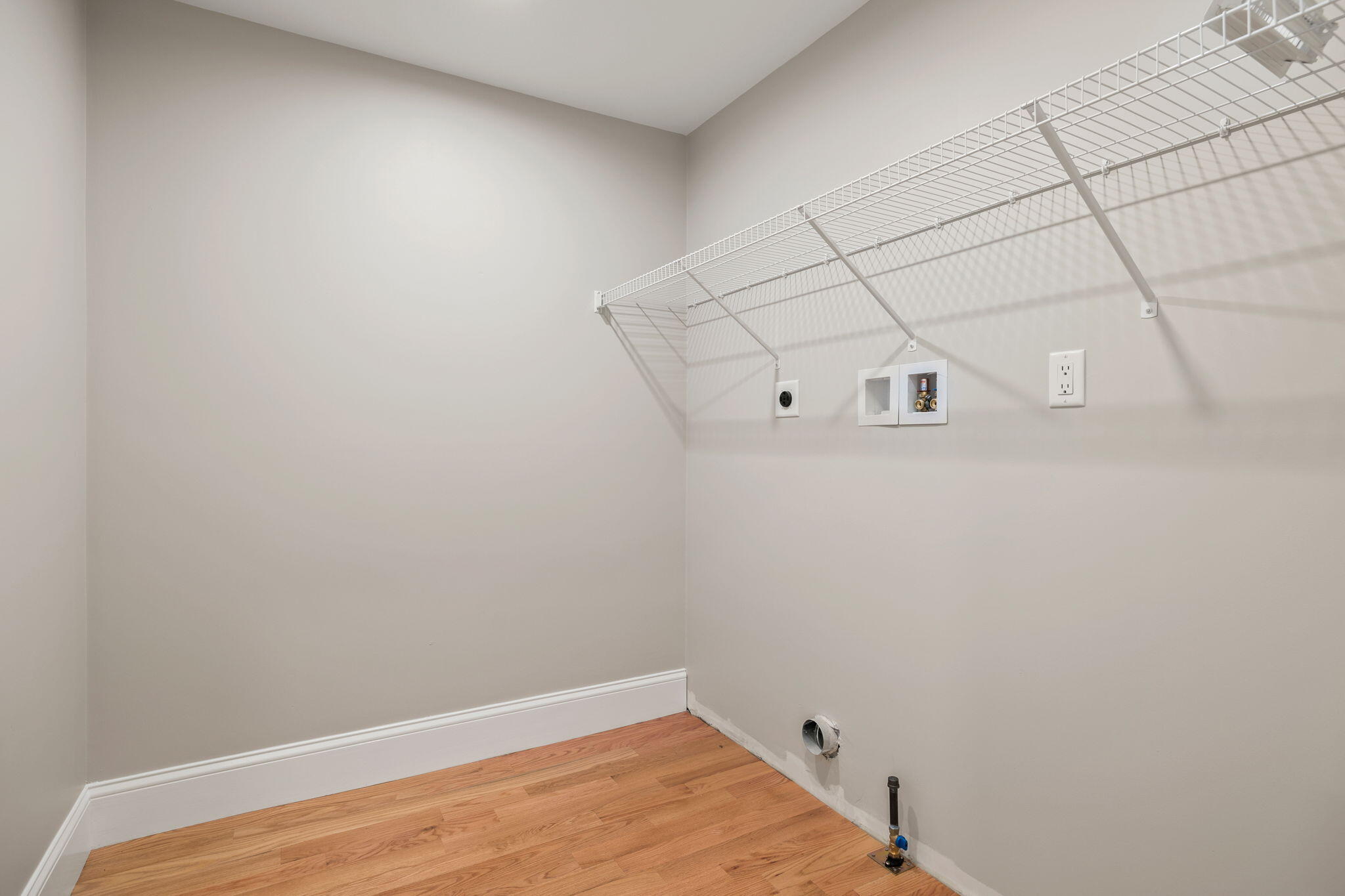 Undisclosed Address Sagamore Beach, MA 02562 - Photo 12 of 43 a view of a room with racks on the wall