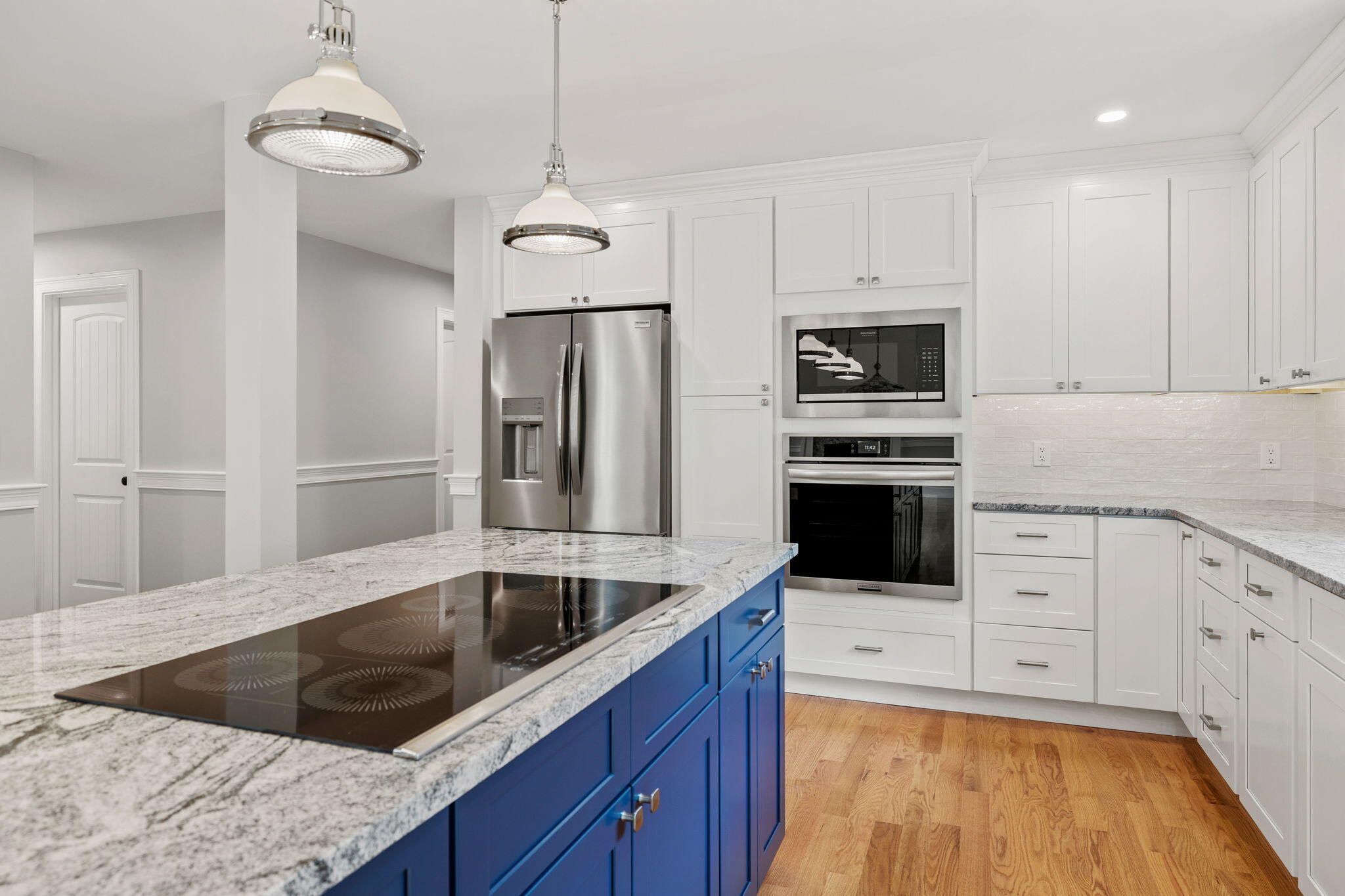Undisclosed Address Sagamore Beach, MA 02562 - Photo 15 of 43 a kitchen with stainless steel appliances kitchen island granite countertop a stove a sink and a refrigerator