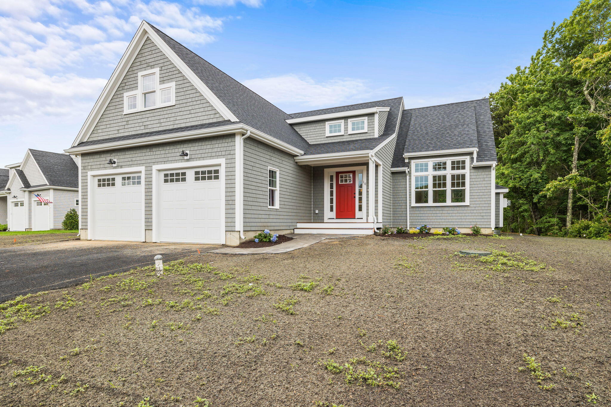 Undisclosed Address Sagamore Beach, MA 02562 - Photo 2 of 43 a view of a house with a yard