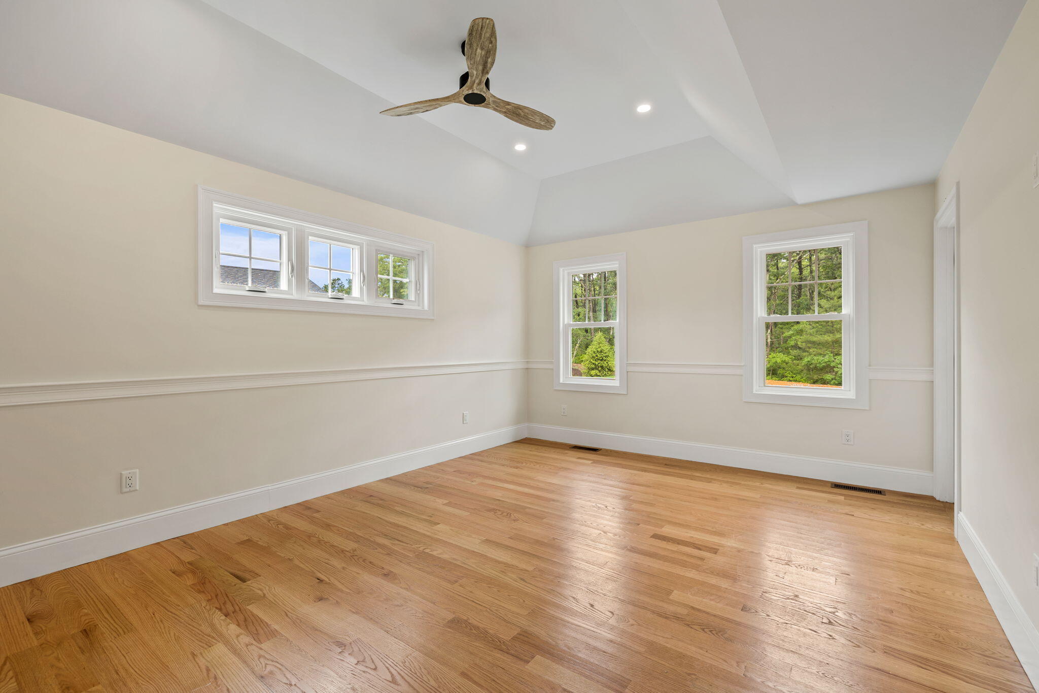Undisclosed Address Sagamore Beach, MA 02562 - Photo 22 of 43 a view of an empty room with a window and wooden floor