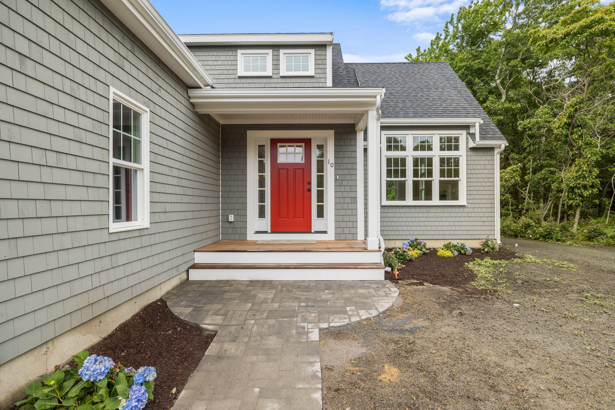 Undisclosed Address Sagamore Beach, MA 02562 - Photo 3 of 43 a front view of a house