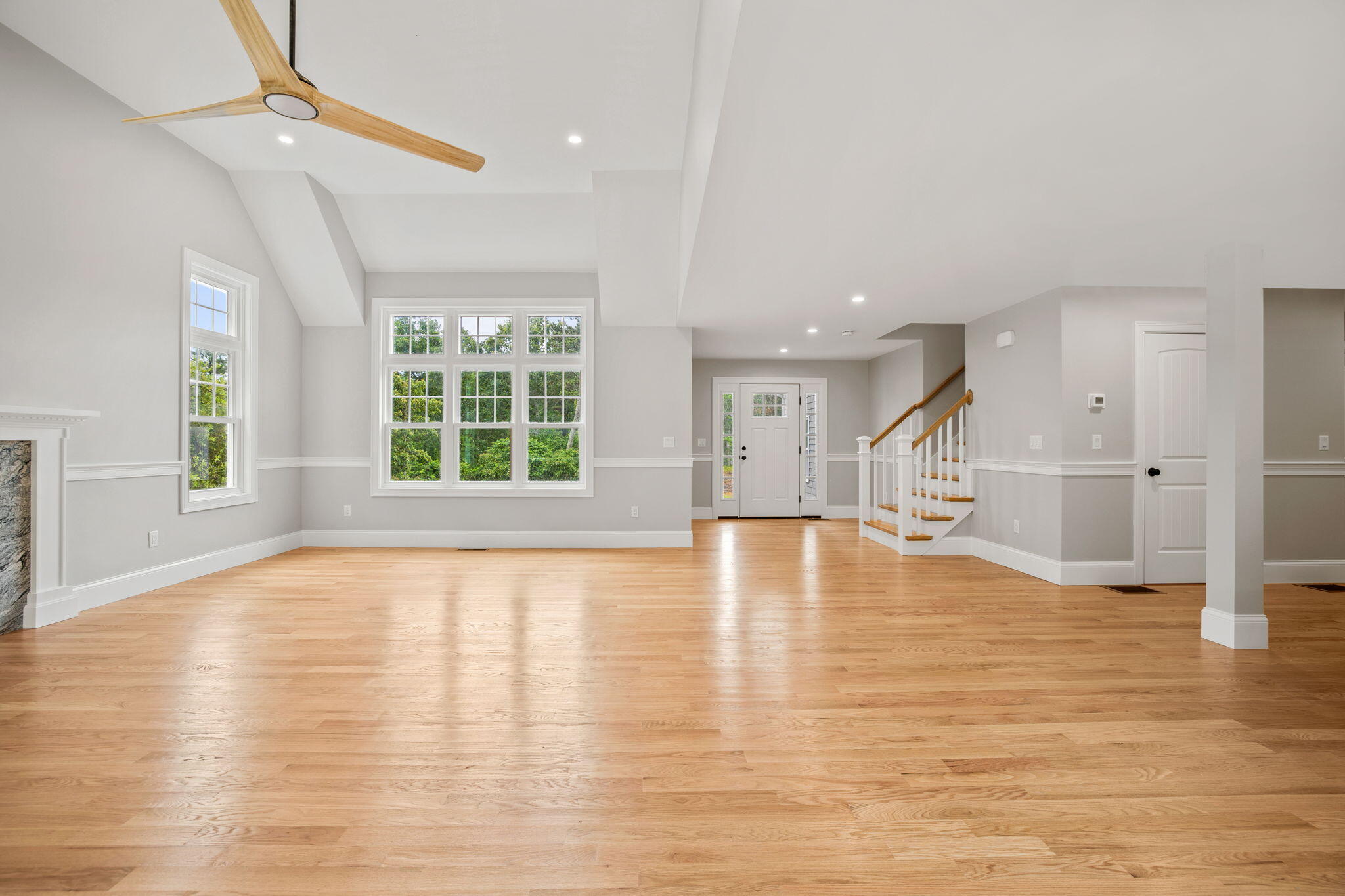 Undisclosed Address Sagamore Beach, MA 02562 - Photo 32 of 43 a view of an empty room with wooden floor and a window
