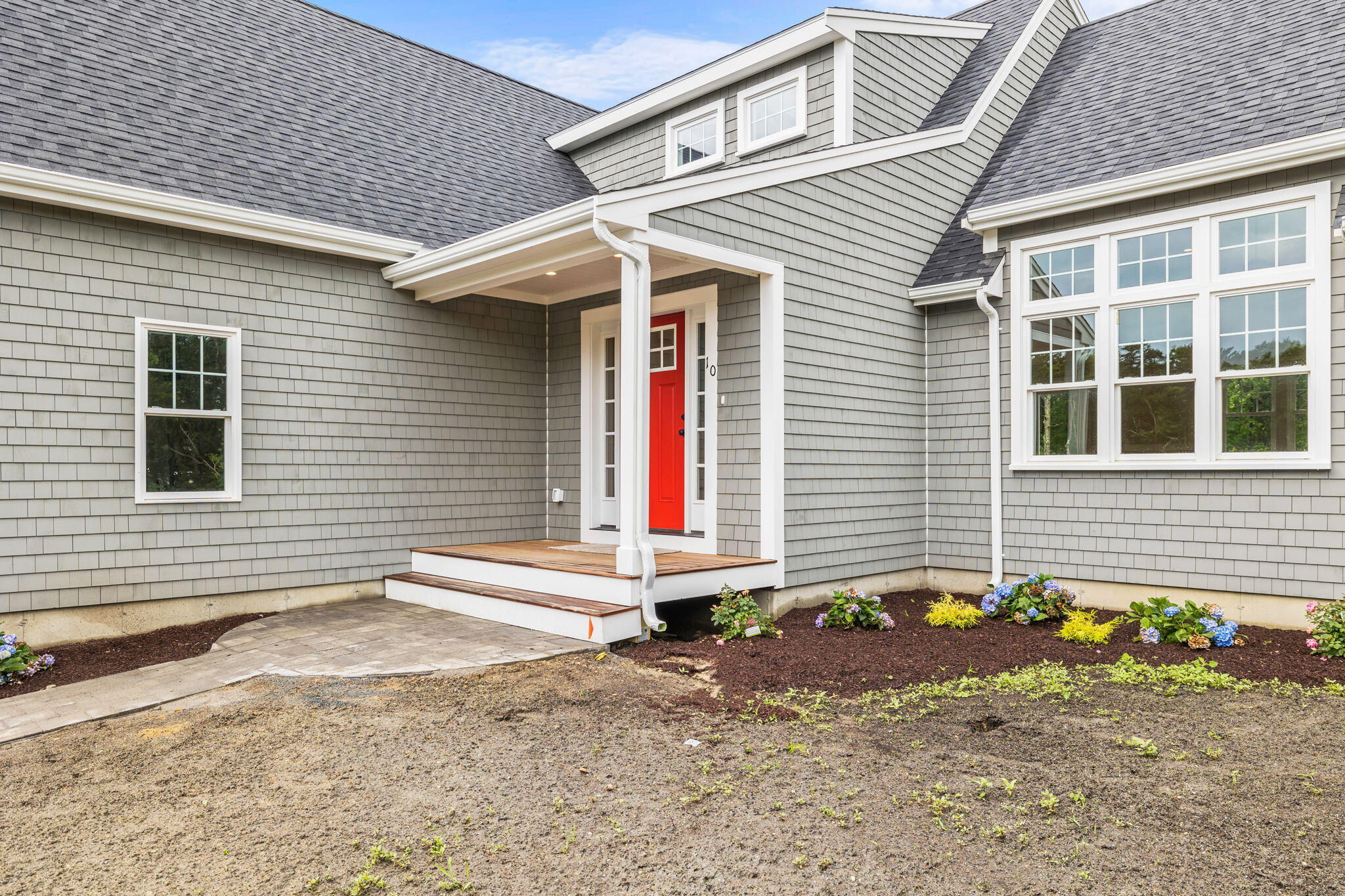 Undisclosed Address Sagamore Beach, MA 02562 - Photo 5 of 43 a front view of a house