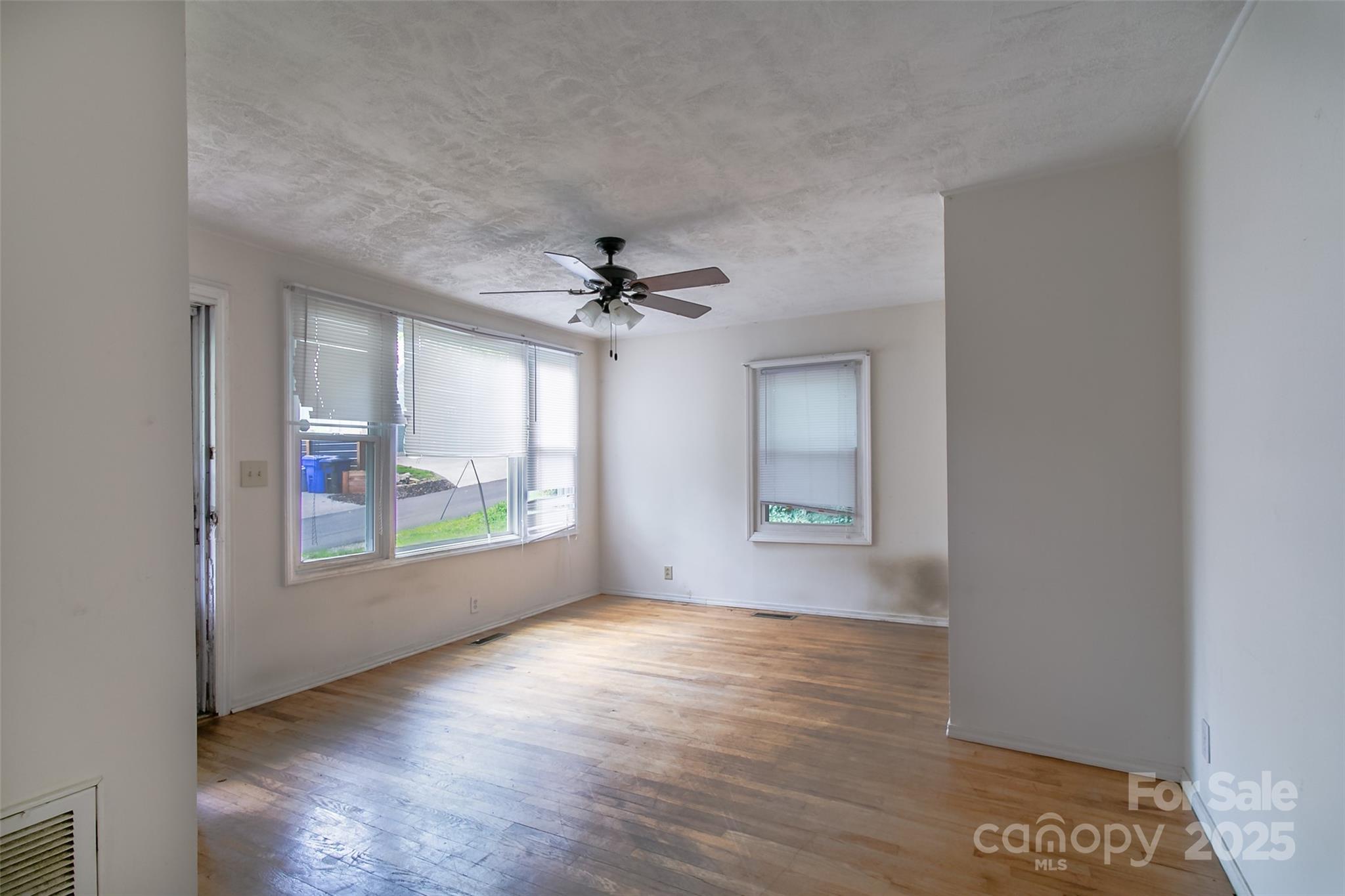 27 Curlee Street Brevard, NC 28712 - Photo 21 of 30 a view of livingroom with window