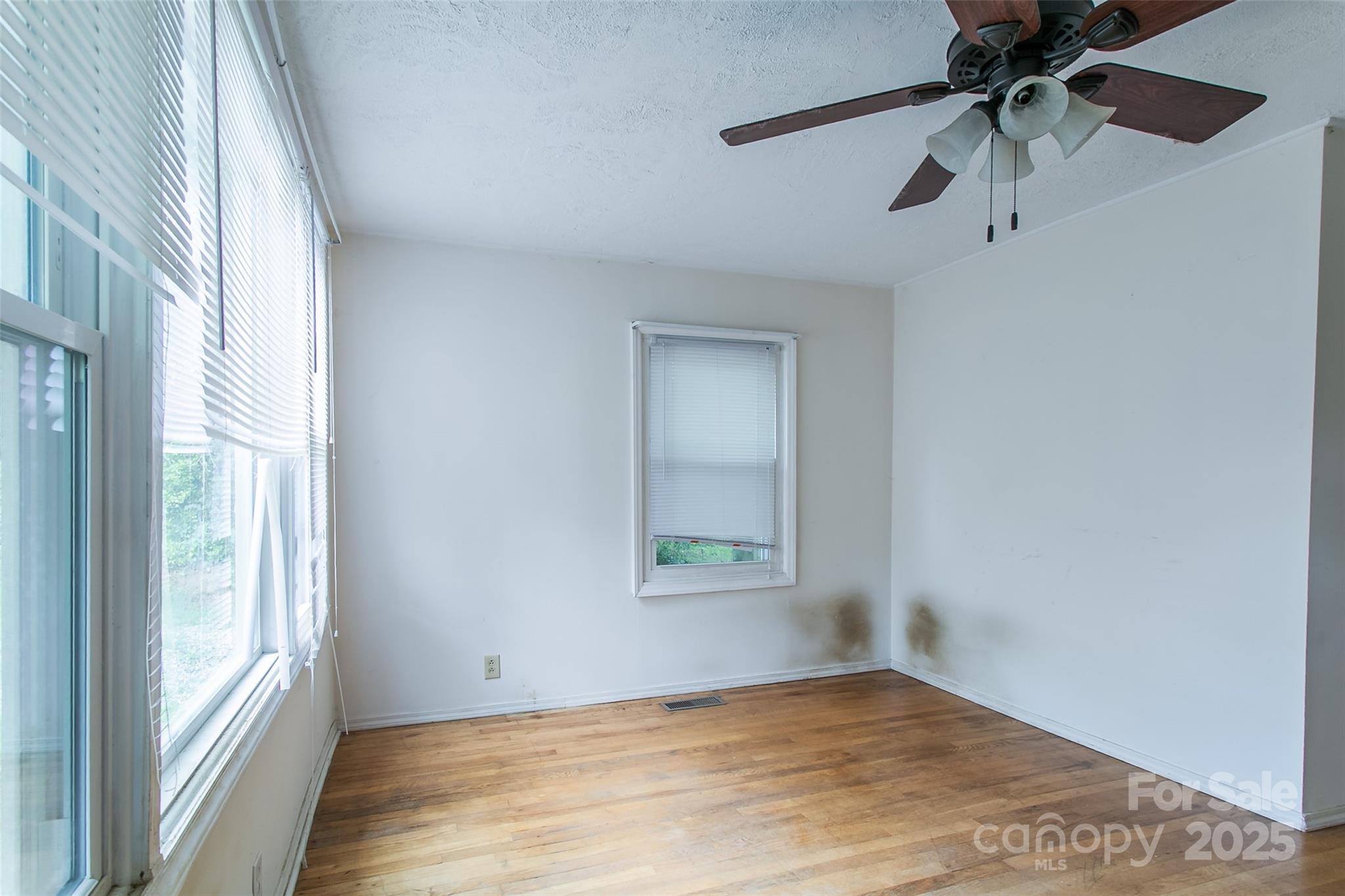 27 Curlee Street Brevard, NC 28712 - Photo 22 of 30 a view of an empty room with a window