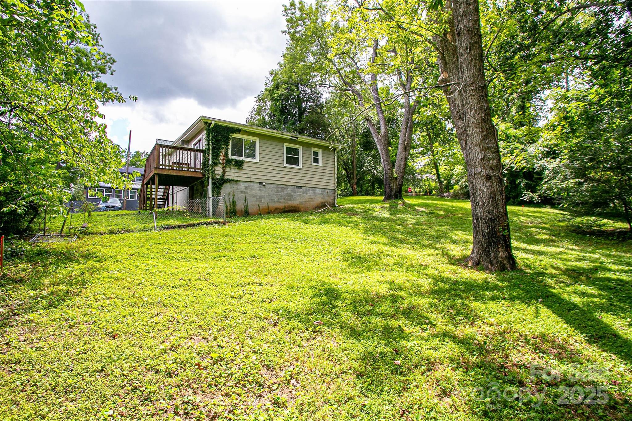 27 Curlee Street Brevard, NC 28712 - Photo 28 of 30 a view of a house with a yard