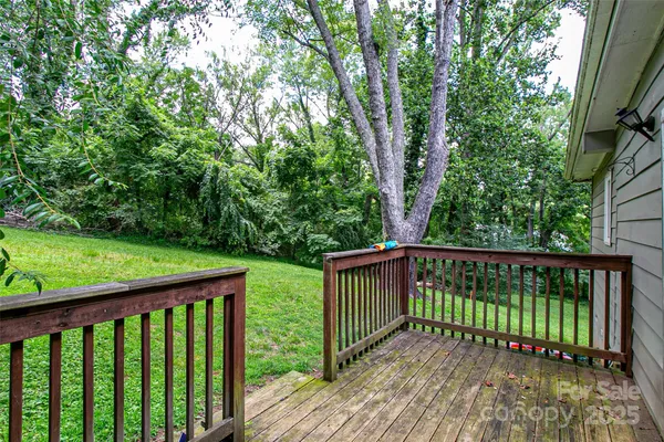 a view of a wooden roof deck