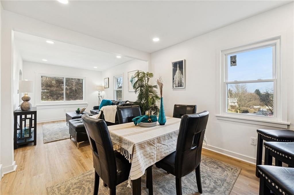 3230 Brodhead Road Aliquippa, PA 15001 - Photo 12 of 38 a view of a dining room with furniture window and wooden floor