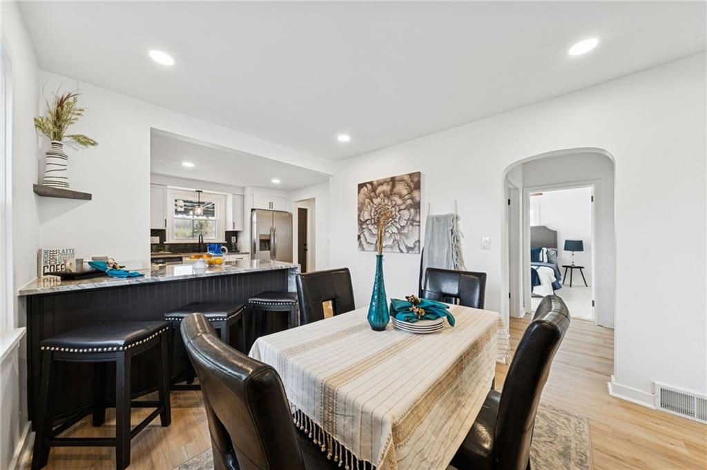 3230 Brodhead Road Aliquippa, PA 15001 - Photo 14 of 38 a dining room with a table and chairs