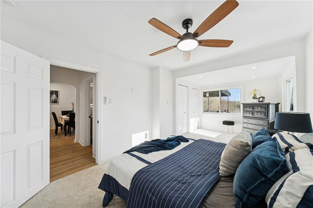 3230 Brodhead Road Aliquippa, PA 15001 - Photo 17 of 38 a bedroom with a bed and a ceiling fan