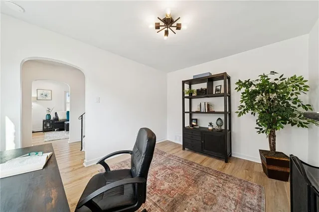 a view of a workspace with furniture and bedroom