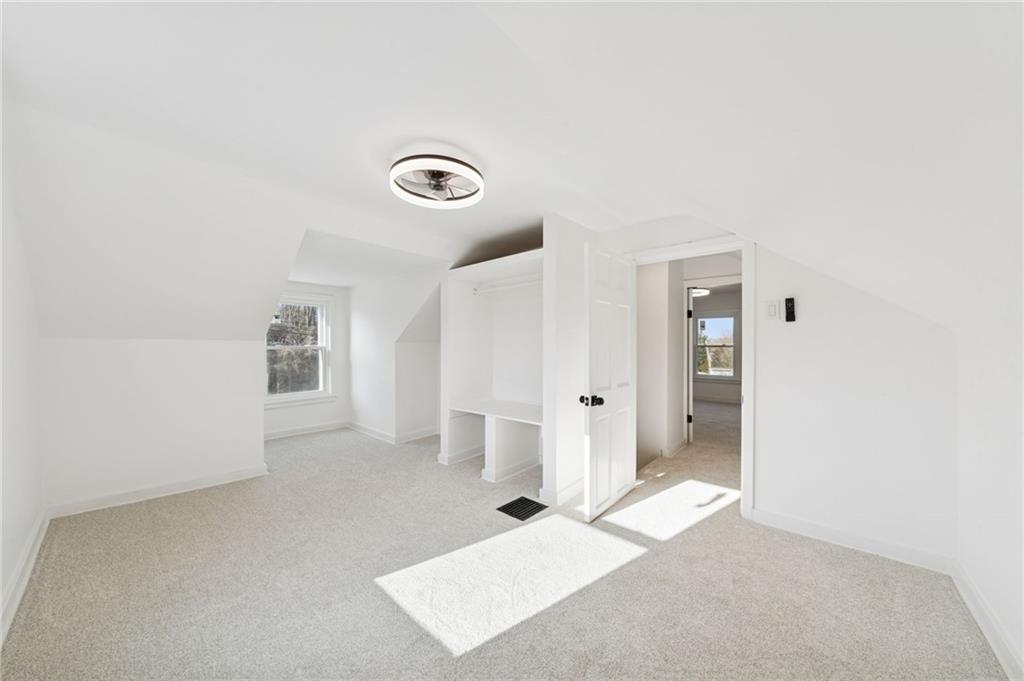 3230 Brodhead Road Aliquippa, PA 15001 - Photo 23 of 38 a view of a livingroom with wooden floor and cabinet