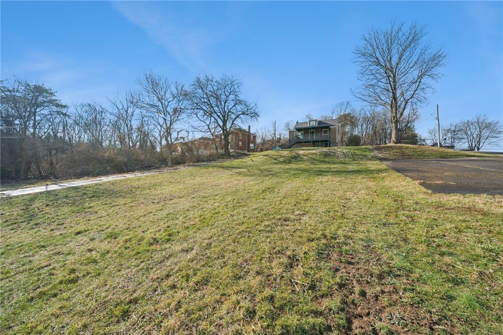 3230 Brodhead Road Aliquippa, PA 15001 - Photo 35 of 38 a view of a yard with a house