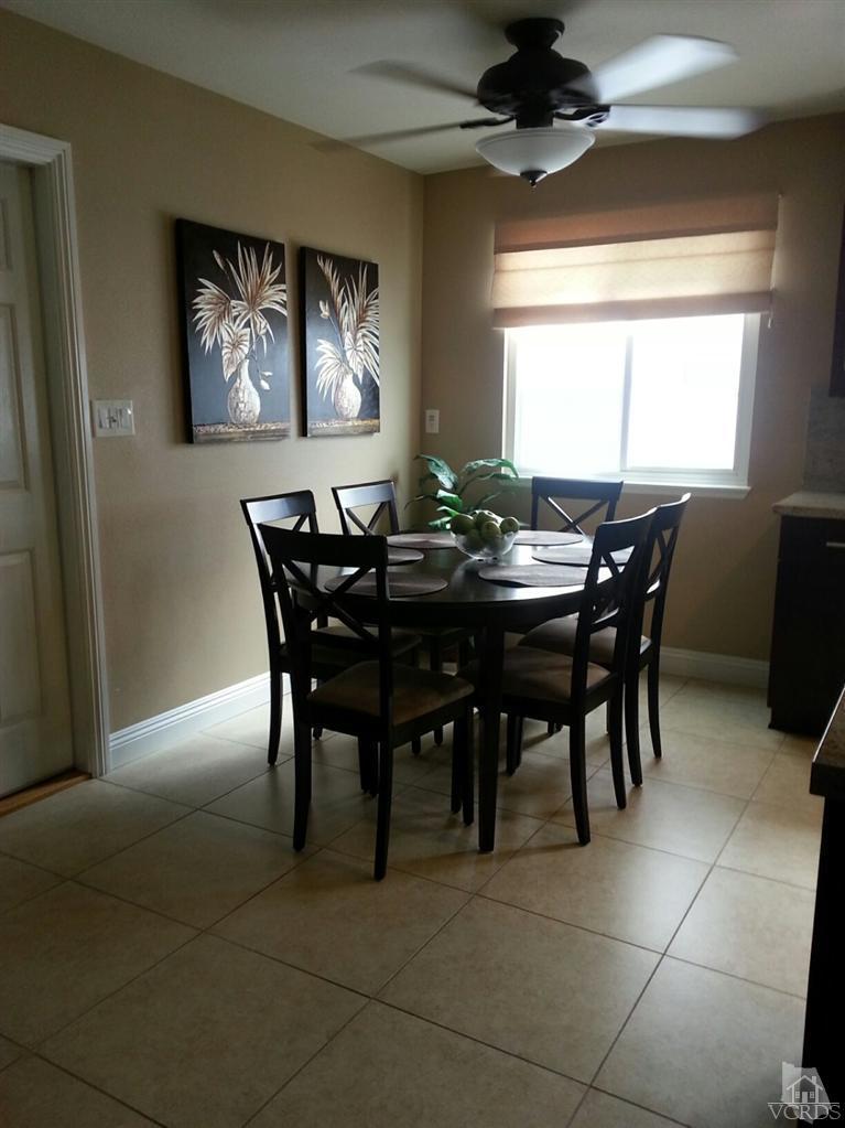 1758 Fitzgerald Road Simi Valley, CA 93065 - Photo 14 of 38 a view of a dining room with furniture and window
