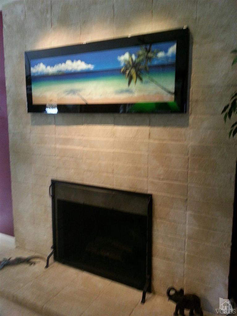 1758 Fitzgerald Road Simi Valley, CA 93065 - Photo 8 of 38 a closeup of a fireplace