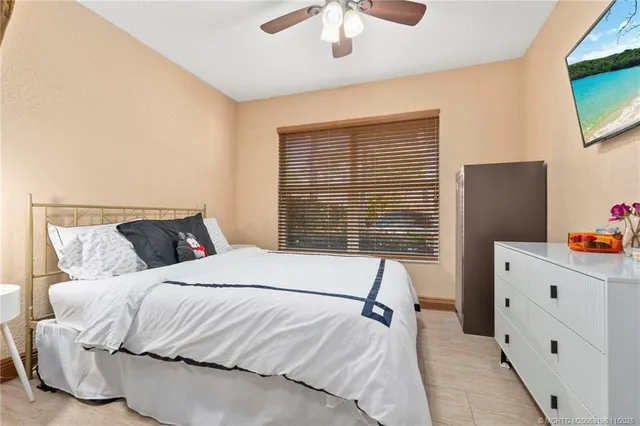 a bathroom with a shower and a sink