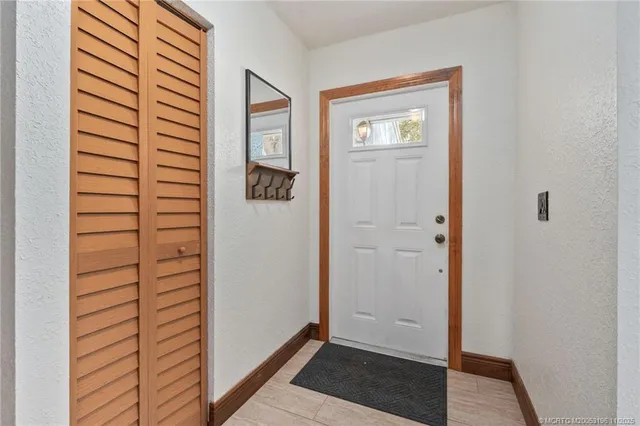 a kitchen with a sink stove and refrigerator