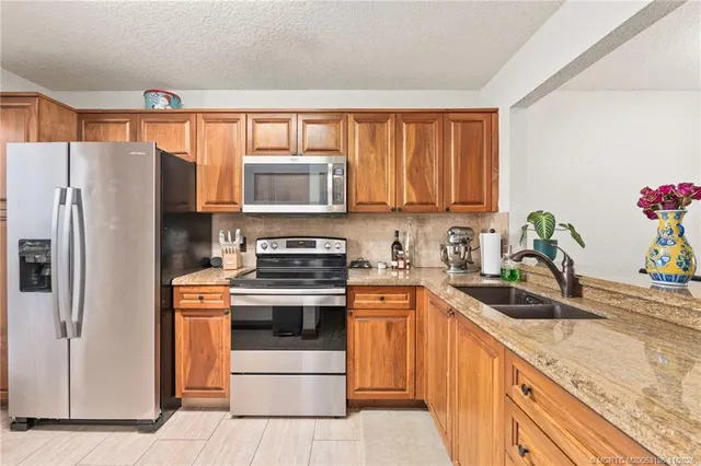 a dining room table chair and a chandelier