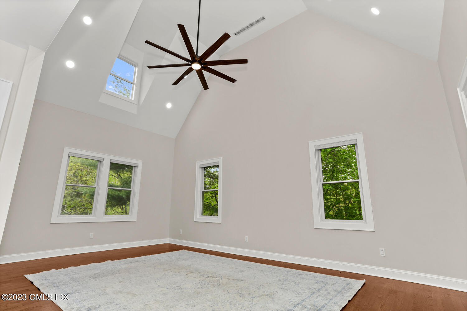 44 Riversville Road, Unit 2 Greenwich, CT 06831 - Photo 10 of 21 an empty room with windows and fan