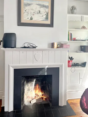 a kitchen with a refrigerator and a stove