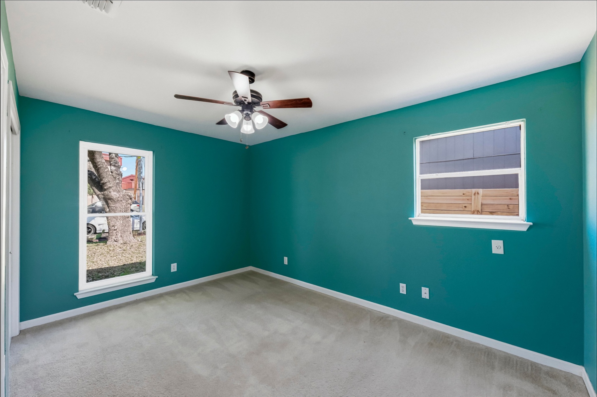 1005 Arthur Stiles Road Austin, TX 78721 - Photo 16 of 29 The bedrooms are carpeted, pleasing color palette. If new buyer doesn't agree, ask for an allowance!