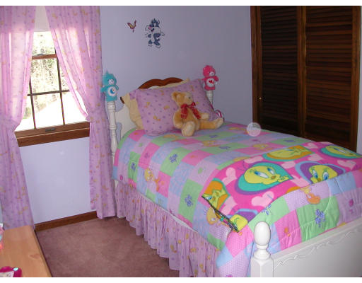 12 Crooks Road North Brookfield, MA 01535 - Photo 13 of 16 a bedroom with a bed and a window